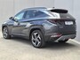 Hyundai Tucson 1.6 T-GDI PHEV Comfort Smart 4WD / Fabrieksgarantie tot 02-2029 / Dealer onderhouden / Glazen schuif- en kanteldak / Stuur- & Stoelverwarming / Trekgewicht 1350 kg / Achteruitrijcamera / Apple Carplay Android Auto / Adaptief cruise control /