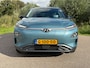 Hyundai Kona Electric EV Premium 64 kWh Long Range / SoH 97.8% / Automaat / Camera / Stoelverwarming - Airco / Leder / PDC /