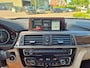 BMW 3-Serie 320i Luxury Edition Individual Schuifdak Apple CarPlay Virtual dash Camera LED NAP 2e eigenaar 320i Luxury Edition