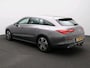 Mercedes-Benz CLA Shooting Brake 180 Business Solution Luxury Trekhaak | Parkeerpakket met achteruitrijcamera | Sfeerverlichting | Ledkoplampen | Stoelverwarming. Inclusief 24 maanden Mercedes-Benz Certified garantie voor Europa.