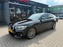 BMW 1-Serie 118i High Executive | M Sport shadow | Stoelverwarming | Climate control |Navigatie | DAB |