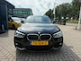 BMW 1-Serie 118i High Executive | M Sport shadow | Stoelverwarming | Climate control |Navigatie | DAB |