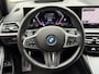 BMW 3-Serie 320e M Sport | Facelift | Panoramadak | Innovation Pack | Adaptieve LED | Adaptieve cruise | CarPlay | Wide screen | Camera | Sportstoelen half leder | Stoelverwarming | Head up | Keyless | Memory | Sfeerverlichting | Harman&kardon | Shadow Line | Elektrische achterklep | Volledig dealeronderhouden