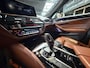 BMW 5-Serie M550i xDrive High Executive Bom vol | leder | beeldschermen achterin | en een adembenemend geluid