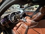 BMW 5-Serie M550i xDrive High Executive Bom vol | leder | beeldschermen achterin | en een adembenemend geluid