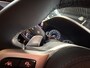 BMW 5-Serie M550i xDrive High Executive Bom vol | leder | beeldschermen achterin | en een adembenemend geluid