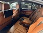 BMW 5-Serie M550i xDrive High Executive Bom vol | leder | beeldschermen achterin | en een adembenemend geluid