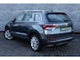 Skoda Karoq 1.5 TSI DSG Style Business | Trekhaak | Panoramadak | Achteruitrijcamera | Parkeersensoren | Keyless Entry | Elektrische Achterklep | Canton Audio | LED Koplampen | Stoelverwarming | Navigatie | Apple Carplay | Android Auto