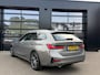 BMW 3-Serie Touring 330i Individual Edition Oxidgrau Pano