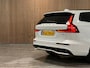 Volvo V60 T8 AWD Recharge Plus Dark | Harman Kardon | Trekhaak | 455pk | 360° Camera | Head-Up Display | Schuifdak | Adaptieve Cruise Control | Stoelverwarming voor+achter | Stuurwielverwarming | Pilot Assist | BLIS Dode Hoek Detectie | Elektrische voorstoelen geheugen | Nappa Lederen bekleding | Zitting verlenging voorstoelen | 18 Inch | Google Infotainment | Keyless Drive | Parkeersensoren voor+achter | Privacy Glass | Elektrisch bedienbare achterklep | DAB Radio | Apple Carplay/Android Auto | Volvo On Call met mobiele App functie | Crystal White Metallic |