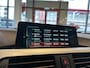 BMW 4-Serie Gran Coupe 418i Individual M-pakket Schuifkanteldak/Automaat/Navigatie/Climate controle/Cruise cotrole/Lederen bekleding+stoelverwarming/Xenon/LED dagrijverlichting/Parkeersensoren achter/Nederlandse auto/Dealeronderhouden