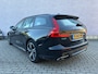 Volvo V60 2.0 T6 Recharge AWD R-Design | Plug-in Hybrid (PHEV) | Trekhaak | Harman Kardon Audio | 360 Graden Camera | Parkeersensoren | Keyless Entry | Elektrische Achterklep | Elektrisch Verstelbare Voorstoelen | Stoelverwarming voor en achter | Cruise Control Adaptief | BLIS | Navigatie | Apple Carplay | Android Auto