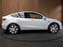 Tesla Model Y Long Range Dual Motor AWD 351pk Navi Camera Leer Warmtepomp ACC Autopilot PDC Elektr. achterklep Stoelverwarmimg voor en achter Stuurverwarming BTW auto SoH is 93,6%