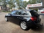 BMW 1-Serie 114i EDE Business+ Trekhaak, Navi, LM..