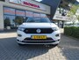 Volkswagen T-Roc 1.5 TSI 150pk 7-DSG Sport Business R met 4 Nieuwe 4 Seizoenenbanden