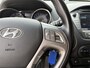 Hyundai ix35 1.6i GDI Go! / NL-Auto / Trekhaak / Half-Leder / Stoelverwarming Voor+Achter / Cruise-Control / Climate-Control / Radio-Bluetooth / Navi / Privacy-Glass / Elektr.-Pakket / PDC-Achter met Camera / LMV 17'' / All-Season / ENZ.