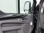 Ford Transit Custom 320 2.0TDCI 170PK Automaat L2H1 Dubbele Cabine 2X Schuifdeur Adap.Cruise 5-Persoons Leder+Verwarmd Trekhaak Navi Camera Pdc Apple Carplay/Android Auto Limited DC Euro 6 Lmv 18" Sidebars Betonplex Vloer Wandbetimmering Lane Assist 3.200KG Trekgewicht