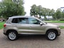 Volkswagen Tiguan 1.4 TSI Track&Field 4Motion Leer Panoramadak/Schuif Parkassist Stoelverwarming Ecc Cruisecontrol Navigatie Pdc Lm Velgen Trekhaak