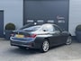BMW 3-Serie 320i xDrive High Executive Edition | Navigatie | Head-Up Display | DAB | Privacy Glass | Lederen Bekleding |