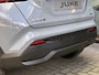 Nissan Juke 1.6 Hybrid Pulse NIEUW UIT VOORRAAD LEVERBAAR | Bose geluidsinstallatie | Parkeersensoren voor- en achter | Lederen bekleding | Voorruitverwarming | Stoelverwarming | Adaptieve Cruise Control | Navigatiesysteem | Tot 10 jaar fabrieksgarantie