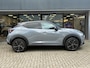 Nissan Juke 1.6 Hybrid Pulse NIEUW UIT VOORRAAD LEVERBAAR | Bose geluidsinstallatie | Parkeersensoren voor- en achter | Lederen bekleding | Voorruitverwarming | Stoelverwarming | Adaptieve Cruise Control | Navigatiesysteem | Tot 10 jaar fabrieksgarantie