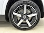 Mercedes-Benz GLB 200 Business Solution AMG 7p. 58 kWh | Premium pakket | Winterpakket | Nightpakket | Sportstoelen pakket | Trekhaak | Vast panoramadak | 19” vijfspaaks lichtmetalen AMG-velgen | GUARD 360°|