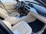 BMW 3-Serie 316i Upgrade Edition Leer/Navi/Cruise/PDC