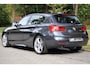 BMW 1-Serie 118i M Sport Leder | Navi Pro | Clima | LED | Alarm kl.3 | Afneembare trekhaak | Stoelverwarming | Hifi | PDC voor en achter | Etc.