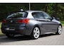 BMW 1-Serie 118i M Sport Leder | Navi Pro | Clima | LED | Alarm kl.3 | Afneembare trekhaak | Stoelverwarming | Hifi | PDC voor en achter | Etc.