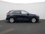 Ford Kuga 2.5 PHEV Titanium | Lederen Bekleding | Camera | PDC Voor+Achter | Keyless | Cruise Control & Snelheidsbegrenzer | Full-Map Navigatie | 17" LMV | Privacy Glass | Draadloze Smartphonelader | Apple Carplay & Android Auto