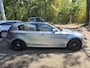 BMW 1-Serie 118i | 3/6 OF 12 MND GARANTIE | SCHUIFDAK | LEDER | AIRCO | CRUISE | NAVI |