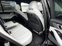 BMW X5 xDrive50e High Executive M Sport | Sky Lounge | Achteras Besturing | BMW Nieren Iconic Glow | Head-UP | Panodak Sky Lounge | Luchtvering | Soft Close | Harman-Kardon | 360 Camera | Trekhaak | Park Assist Prof | Individual Leder Merino | Zwarte Hemel |