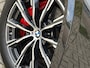 BMW X5 xDrive50e High Executive M Sport | Sky Lounge | Achteras Besturing | BMW Nieren Iconic Glow | Head-UP | Panodak Sky Lounge | Luchtvering | Soft Close | Harman-Kardon | 360 Camera | Trekhaak | Park Assist Prof | Individual Leder Merino | Zwarte Hemel |