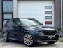 BMW X5 xDrive50e High Executive M Sport | Sky Lounge | Achteras Besturing | BMW Nieren Iconic Glow | Head-UP | Panodak Sky Lounge | Luchtvering | Soft Close | Harman-Kardon | 360 Camera | Trekhaak | Park Assist Prof | Individual Leder Merino | Zwarte Hemel |