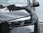 BMW X5 xDrive50e High Executive M Sport | Sky Lounge | Achteras Besturing | BMW Nieren Iconic Glow | Head-UP | Panodak Sky Lounge | Luchtvering | Soft Close | Harman-Kardon | 360 Camera | Trekhaak | Park Assist Prof | Individual Leder Merino | Zwarte Hemel |