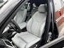 BMW X5 xDrive50e High Executive M Sport | Sky Lounge | Achteras Besturing | BMW Nieren Iconic Glow | Head-UP | Panodak Sky Lounge | Luchtvering | Soft Close | Harman-Kardon | 360 Camera | Trekhaak | Park Assist Prof | Individual Leder Merino | Zwarte Hemel |