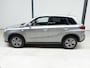 Suzuki Vitara Exclusive 2WD ✅Stoelverw.✅Camera✅Cruise✅Afn. Trekhaak✅