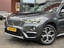 BMW X1 xDrive20i Executive // PANO / SCHUIF- KANTELDAK // NAVI // PDC V+A // CRUISE // TREKHAAK // ELEK. ACHTERKLEP //