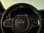 Volvo XC60 T6 AWD Recharge Plus Dark | Harman Kardon | Schuifdak | 360° Camera | Adaptieve Cruise Control | Stoelverwarming voor+achter | Stuurwielverwarming | Full LED Meesturende koplampen | Pilot Assist | BLIS Dode Hoek Detectie | Elektrische voorstoelen geheugen | R-Design Contour stoelen met wit stiksel en bies | Zitting verlenging voorstoelen | Lederen dashboard | 19 Inch | Google Infotainment | Keyless Drive | Elektrisch bedienbare achterklep | DAB Radio | Apple Carplay/Android Auto | Draadloos telefoon opladen | Volvo On Call met mobiele App functie | Platinum Grey Metallic |