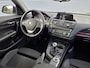 BMW 1-Serie 114i EDE Business Sport | Trekhaak | Camera | Navigatie | Bluetooth | Airc
