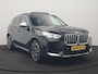 BMW iX1 xDrive30 X Line 67 kWh 313pk Dealer O.H. | Trekhaak Af Fabriek | Panodak | Head Up | Adaptive Cruise | 360 Camera | Harman / Kardon | Lederen Sportstoelen Massage & Memory | Keyless | Sfeerverlichting | Stoelen & Stuur Verwarmd | Apple Carplay | Widescreen Navi | DAB | 19"L.M |