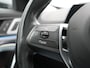 BMW iX1 xDrive30 X Line 67 kWh 313pk Dealer O.H. | Trekhaak Af Fabriek | Panodak | Head Up | Adaptive Cruise | 360 Camera | Harman / Kardon | Lederen Sportstoelen Massage & Memory | Keyless | Sfeerverlichting | Stoelen & Stuur Verwarmd | Apple Carplay | Widescreen Navi | DAB | 19"L.M |