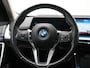 BMW iX1 xDrive30 X Line 67 kWh 313pk Dealer O.H. | Trekhaak Af Fabriek | Panodak | Head Up | Adaptive Cruise | 360 Camera | Harman / Kardon | Lederen Sportstoelen Massage & Memory | Keyless | Sfeerverlichting | Stoelen & Stuur Verwarmd | Apple Carplay | Widescreen Navi | DAB | 19"L.M |