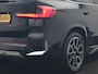 BMW iX1 xDrive30 X Line 67 kWh 313pk Dealer O.H. | Trekhaak Af Fabriek | Panodak | Head Up | Adaptive Cruise | 360 Camera | Harman / Kardon | Lederen Sportstoelen Massage & Memory | Keyless | Sfeerverlichting | Stoelen & Stuur Verwarmd | Apple Carplay | Widescreen Navi | DAB | 19"L.M |