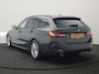BMW 3-Serie Touring 320e Facelift PHEV Dealer O.H. | Dravitgrau metallic | Head Up | Camera | Widescreen Navi | Stoelverwarming | Apple Carplay | Blis | Adaptive LED | Park Assist | DAB | Plug In Hybrid |
