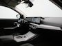 BMW 3-Serie Touring 320e Facelift PHEV Dealer O.H. | Dravitgrau metallic | Head Up | Camera | Widescreen Navi | Stoelverwarming | Apple Carplay | Blis | Adaptive LED | Park Assist | DAB | Plug In Hybrid |