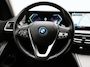 BMW 3-Serie Touring 320e Facelift PHEV Dealer O.H. | Dravitgrau metallic | Head Up | Camera | Widescreen Navi | Stoelverwarming | Apple Carplay | Blis | Adaptive LED | Park Assist | DAB | Plug In Hybrid |