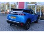 Peugeot 2008 1.2 130PK ALLURE PACK | TREKHAAK AFNEEMBAAR | NAVIGATIE 10" TOUCHSCREEN | APPLE CARPLAY/ANDROID AUTO | ACHTERUITRIJ CAMERA | 3-D INSTRUMENTENPANEEL | CLIMATE CONTROL | CRUISE CONTROL | KEYLESS ENTRY / START | 17" LICHTMETALEN VELGEN |