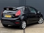 Ford Fiesta 1.4 Titanium LPG/BENZINE 5 deurs - APK TM 04-06-2027 - ECC - CRUISE CONTROLE - LMV - PDC - EL. INKLAPBARE SPIEGELS - BLUETOOTH - VERWARMDE VOORRUIT - NAP - NL AUTO - LEES TEKST!