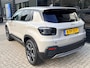 Jeep Avenger Summit 54 kWh 156 PK | ADAPTIEVE CRUISE CONTROL| SFEERVERLICHTING| DODEHOEK DETECTIE| DRAADLOZE TELEFOONLADER| JEEP PERFORMANCE LED| CAMERA + PARKEERSENSOREN| APPLE CARPLAY/ANDROID AUTO| EERSTE EIGENAAR|